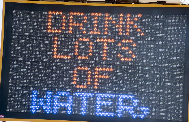 Free Stock Photo: Sage advice to Drink Lots of Water on an electronic signboard in a close up full frame view