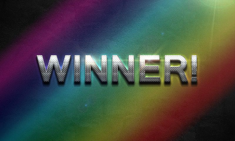 Free Stock Photo: Rainbow colored sign announcing a Winner with metallic lettering and exclamation mark