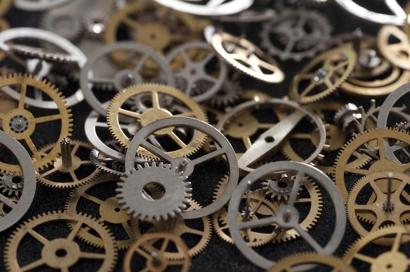 Free Stock Photo: macro images of tiny gear wheels or cogs from a watch or clock