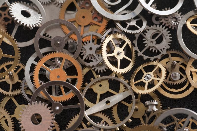 Free Stock Photo: an assrotment of gears and wheels from a clockmakers parts box