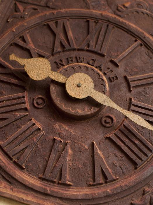 Free Stock Photo: antique clock face with minute and hour hands with the word Newgate in the center and Roman numerals