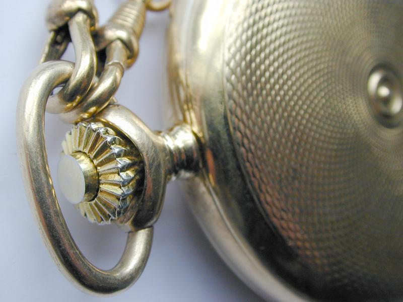Free Stock Photo: close up on the spring winder crown of an old pocket watch
