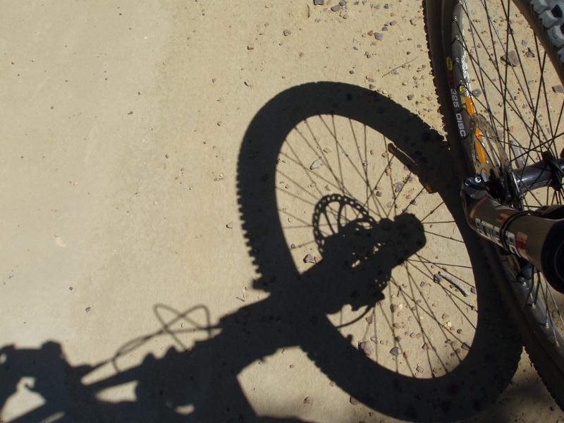 Free Stock Photo: looking down at the front wheel of a downhill mountainbike