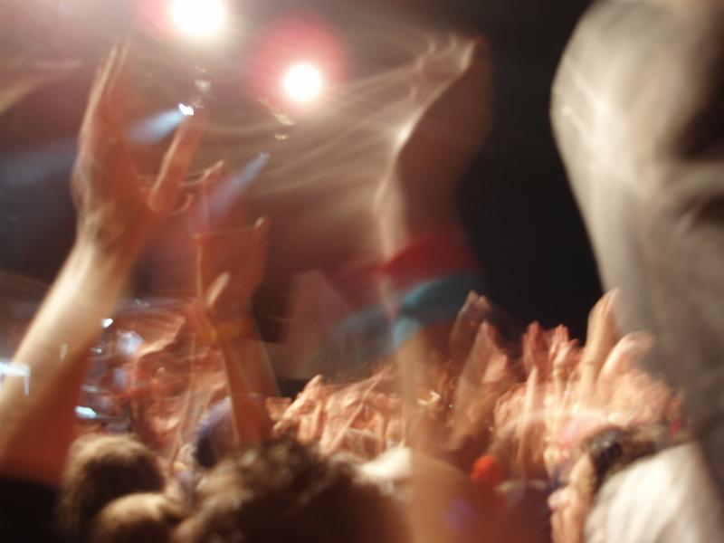 Free Stock Photo: excited fans waving their hands in the air at a rock concert