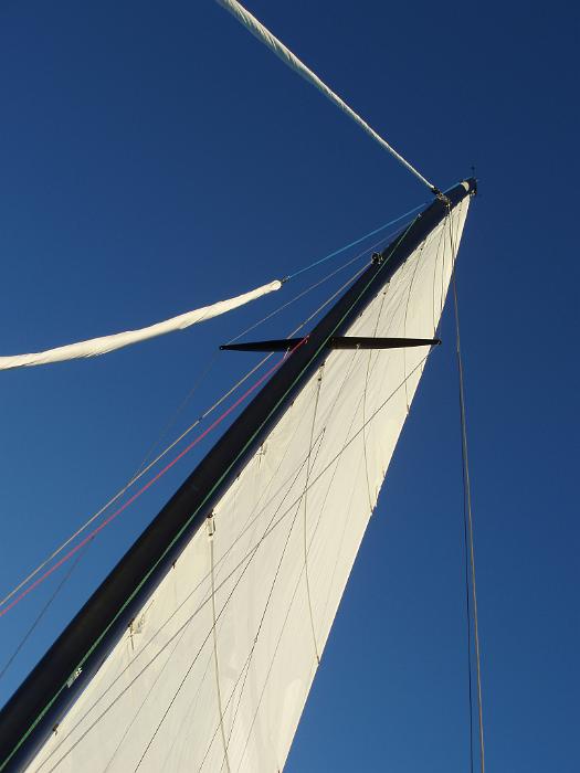 Free Stock Photo: laying on the deck of a sailing yacht looking up at the sky