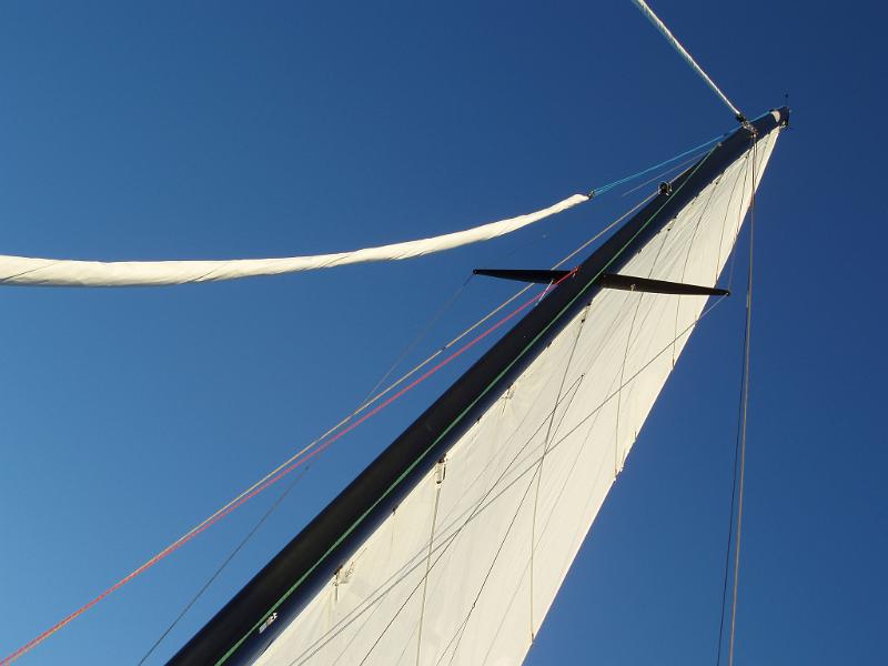 Free Stock Photo: laying back and looking up at the mast as you sail along on a yacht