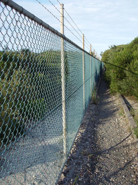 Free Stock Photo: a wire fence, barrier to new ideas, travel or trapped emotions