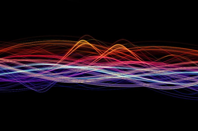 Free Stock Photo: an abstract background image featuring colourful waves of light