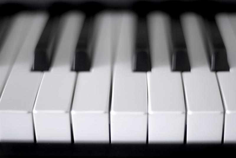 Free Stock Photo: an octave of musical notes on a piano keyboard