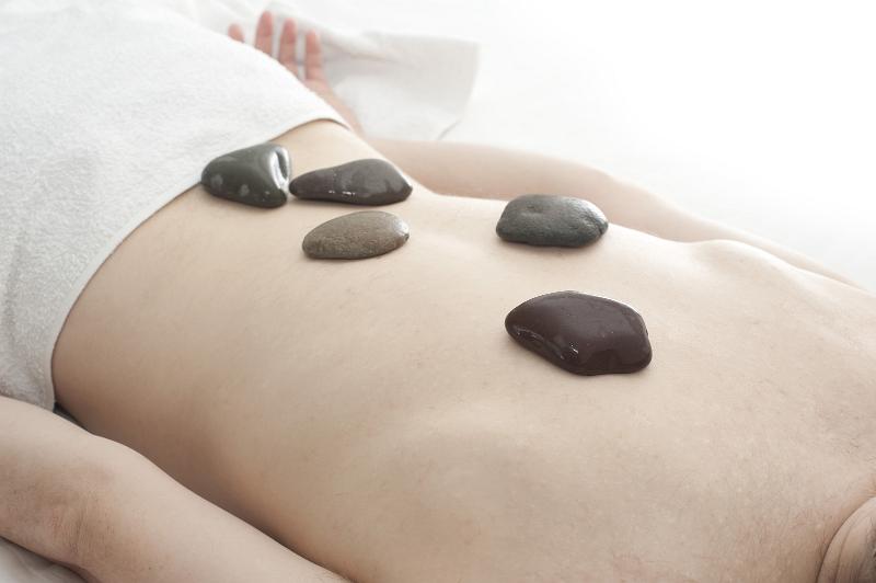 Free Stock Photo: taking relaxing hot rock massage