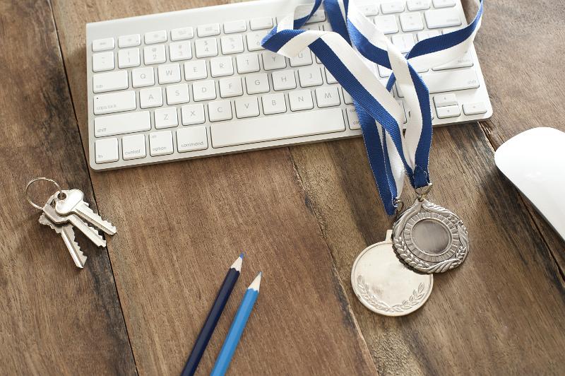 Free Stock Photo: sports science and technology concept with a pair of winning medals