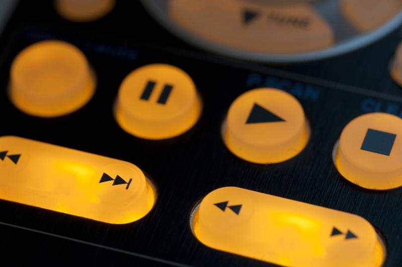 Free Stock Photo: Illuminated media playback buttons detail with pause, forward or play and stop controls in a personal entertainment concept