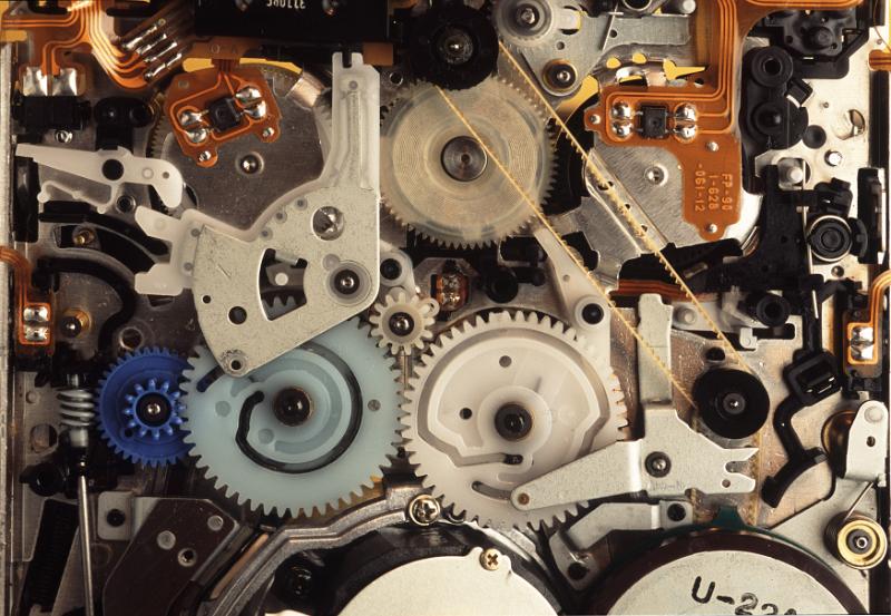 Free Stock Photo: Overhead close up view of multiple different plastic and metal multicolor motors and gears as mechanical background concept