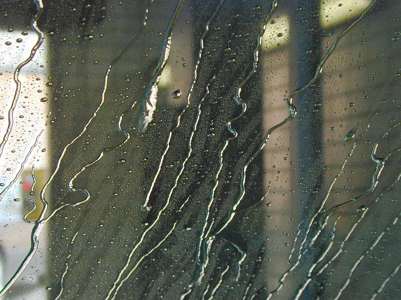 Free Stock Photo: Water rivulets on a car window in a car wash running down the glass in a full frame background