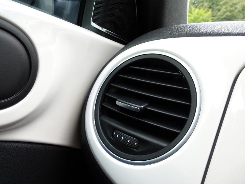 Free Stock Photo: Close up of round automobile vent hole.