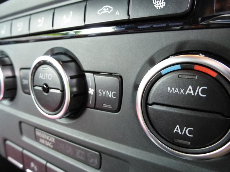 Free Stock Photo: Air conditioning control dial on the dashboard in a car in a close up selective focus view
