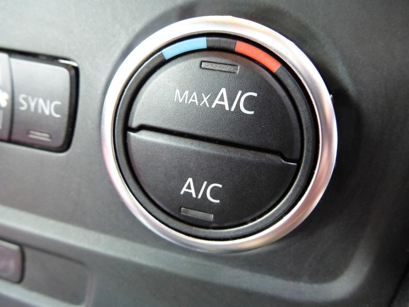 Free Stock Photo: Climate control knob on a car dashboard with heating, cooling and air conditioning