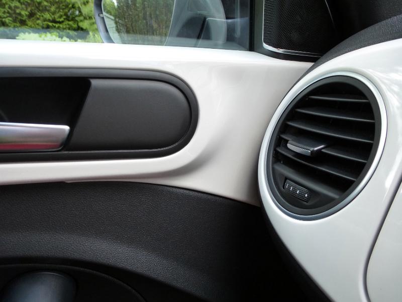 Free Stock Photo: Close up detail of circular adjustable vent inside automobile with neutral color scheme