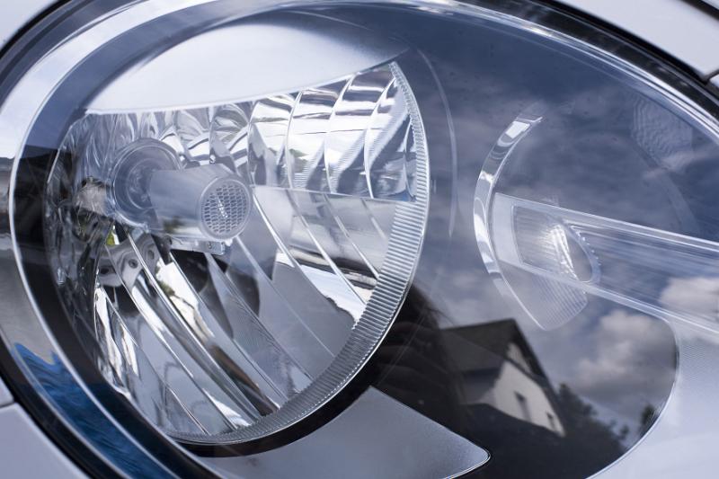 Free Stock Photo: Crop close up car headlight with reflection of sky