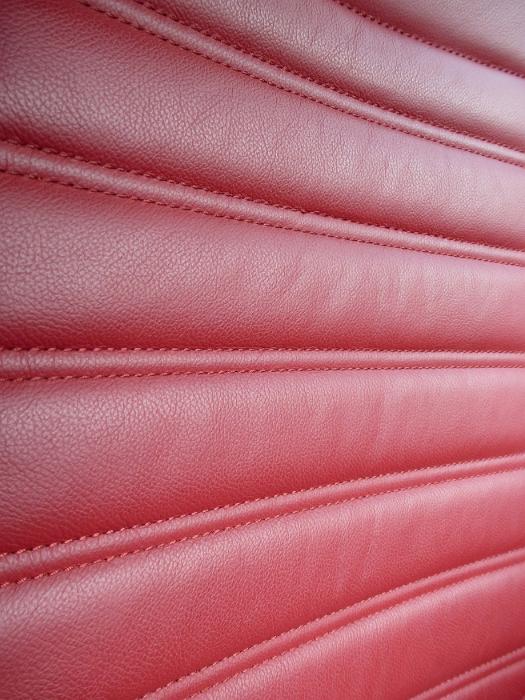 Free Stock Photo: Crop close texture of leather red seat in car.