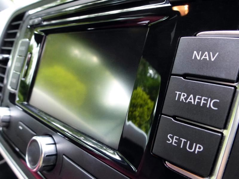 Free Stock Photo: Car controls for setting up navigation on a dashboard with traffic and satellite buttons alongside a blank display screen