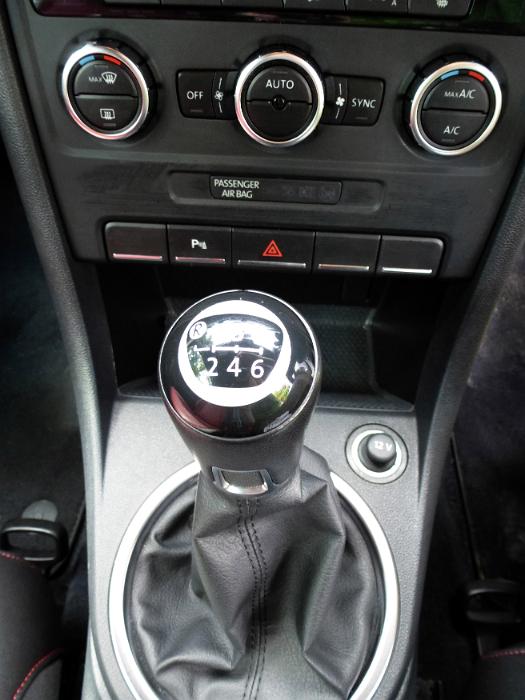 Free Stock Photo: Manual gear shift in a modern car viewed from above with the console and assorted controls