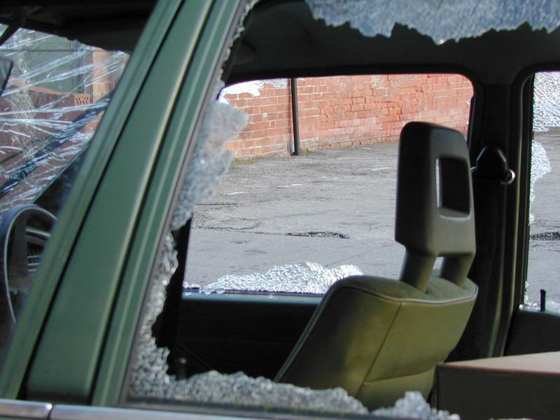 Free Stock Photo: Broken shattered car window with a view to the front seat on a car that has been involved in a traffic accident, close up view