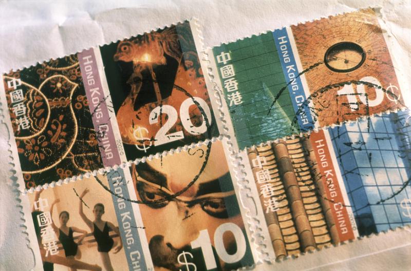 Free Stock Photo: Cancelled Japanese postage stamps on a parcel or large letter in a concept of mail or postal correspondence and communication