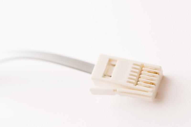 Free Stock Photo: Plug of phone connector cable against white background