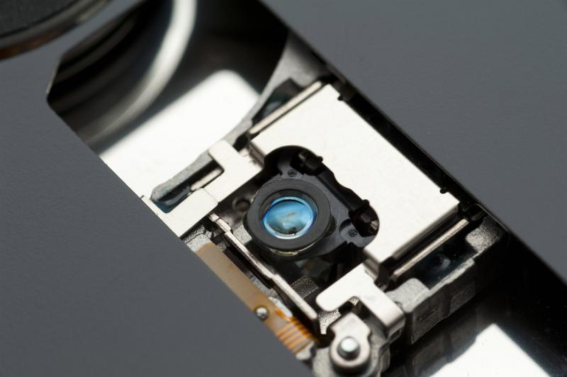 Free Stock Photo: CD-ROM laser lens with electronic parts in close-up view