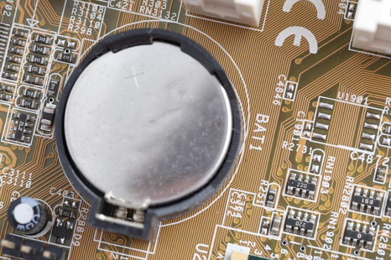 Free Stock Photo: Closeup overhead view of lithium computer CMOS battery on motherboard