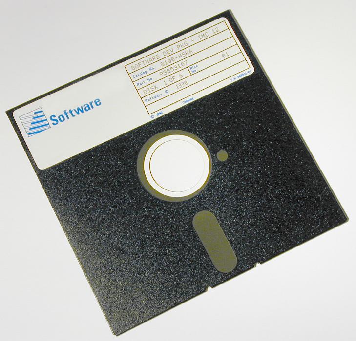 Free Stock Photo: Old 5 and 1/4  inche diskette with label against white background