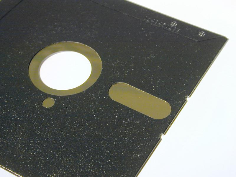 Free Stock Photo: Old floppy disk for magnetic storage of data isolated on white in a close up view with copy space in a technology concept