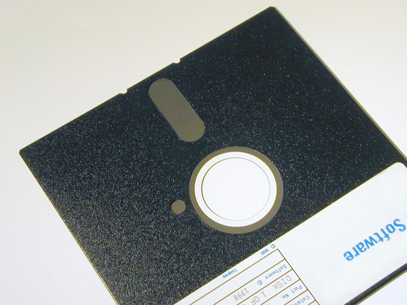 Free Stock Photo: Old floppy disk, a flexible removable magnetic disk that stores data for use in a microprocessor on a computer isolated on white
