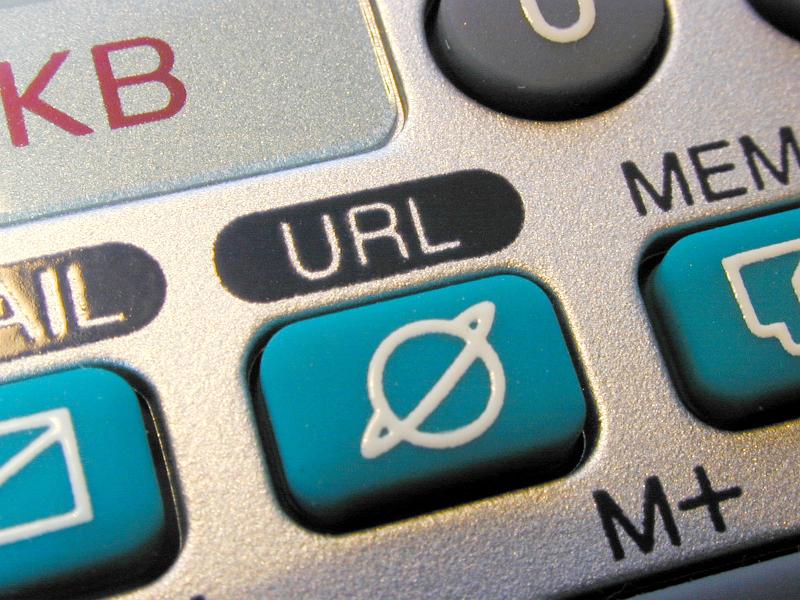 Free Stock Photo: A close up of a blue URL button on silver organiser computer keyboard.