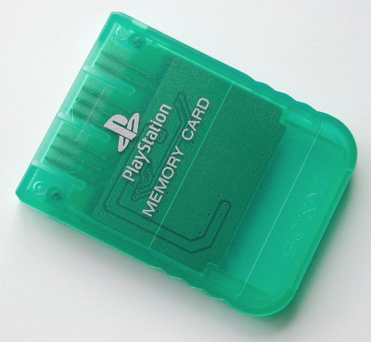Free Stock Photo: Closeup of green Playstation memory card on white background