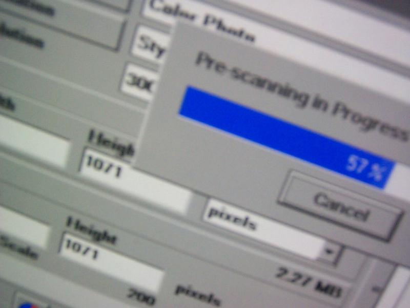 Free Stock Photo: Photoshop processing scanner progress bar at 57 percent
