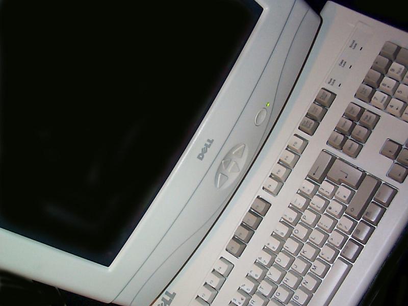 Free Stock Photo: Angled first person view on keyboard and monitor with blank screen for copy space - editorial use only
