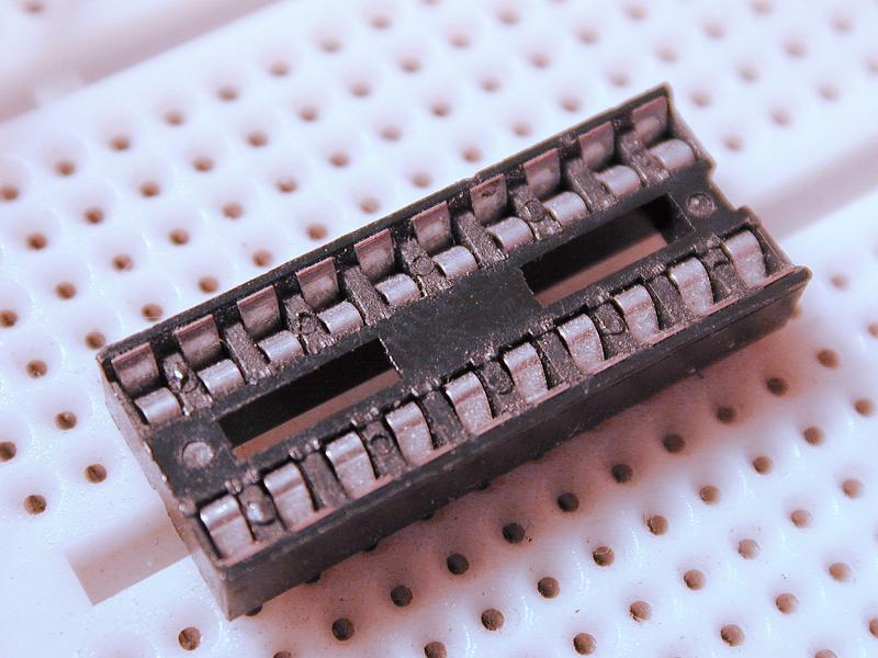 Free Stock Photo: Closeup of old microchip in plastic electronic circuit board