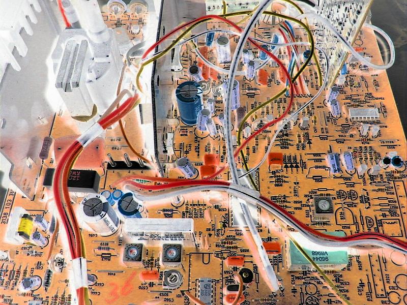 Free Stock Photo: A high key, detailed view of a television circuit board, wiring and chassis in retro style tones.
