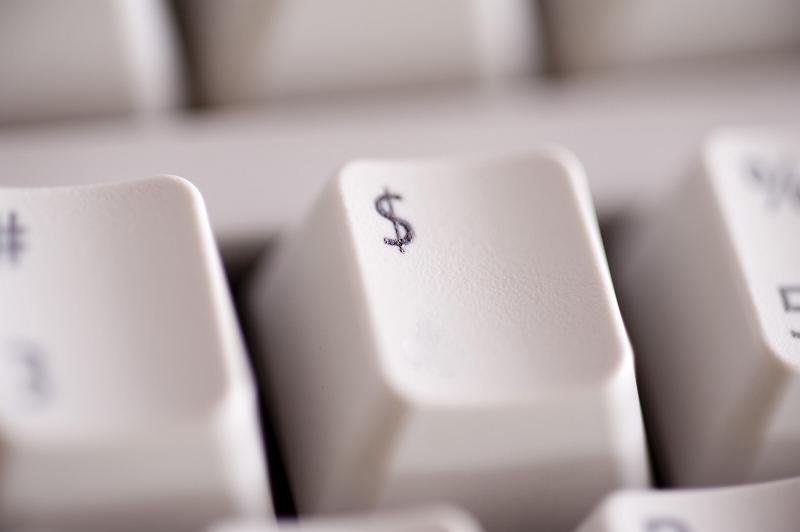 Free Stock Photo: a computer keyboard with a dollar symbol in focus