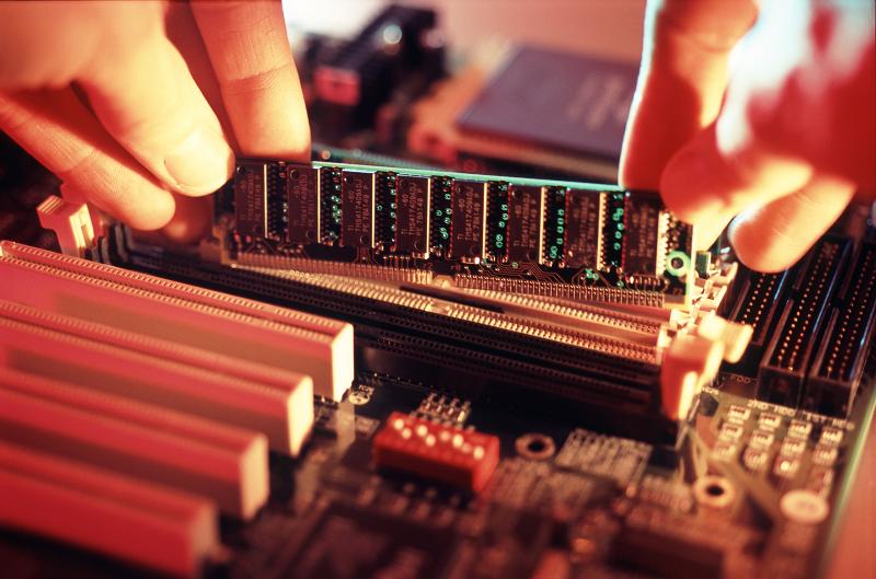 Free Stock Photo: installing a computer memory upgrade