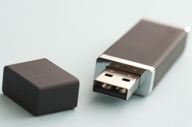 Free Stock Photo: Open portable computer memory flash drive with focus to the universal USB connection or plug