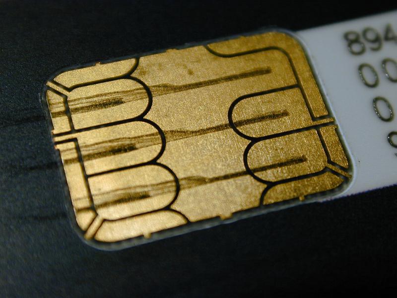 Free Stock Photo: Metal contacts on the back of a sim cad or credit card smart chip