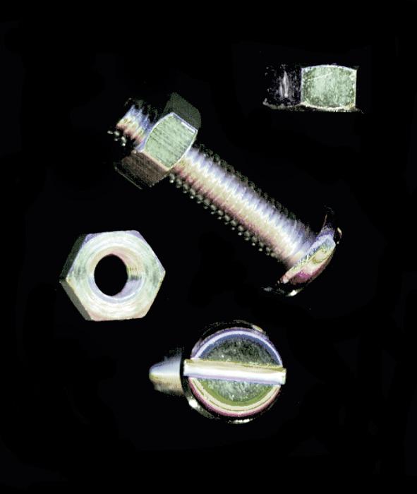 Free Stock Photo: New steel bolt and nut showing different aspects with the assembled unit, loose nuts and the head of the bolt on a black background