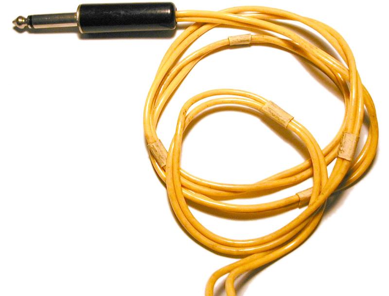 Free Stock Photo: Thick quarter inch yellow audio cord close-up
