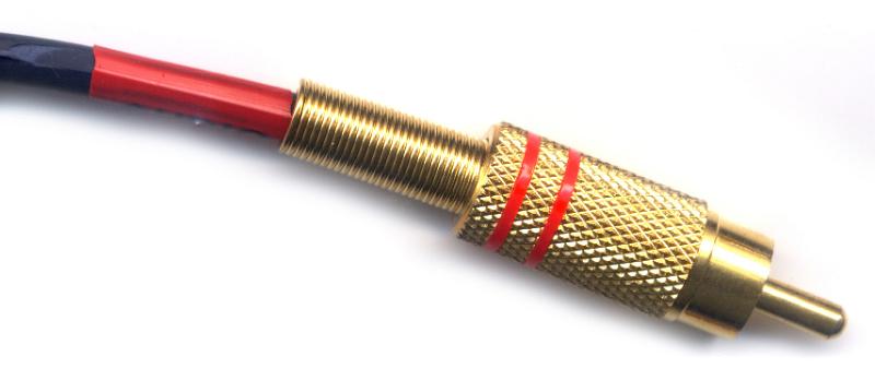 Free Stock Photo: Metal RCA plug of golden color with red label stripes close-up isolated on white background