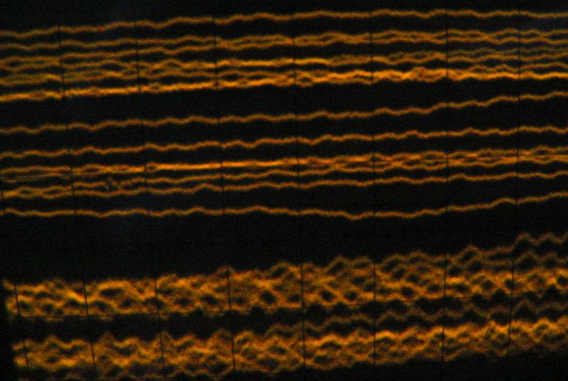 Free Stock Photo: Orange noise lines on a CRT oscilloscope screen