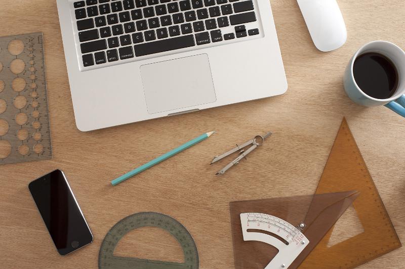 Free Stock Photo: Engineers workspace from above with computer, rulers and cup of coffee