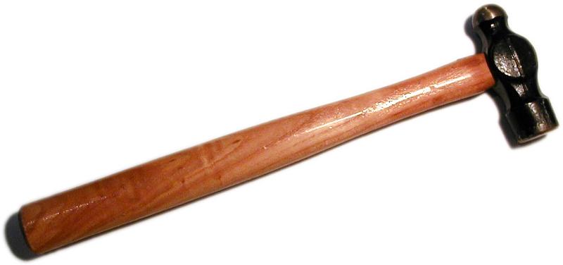 Free Stock Photo: Small hammer with wooden handle lying diagonally on white in a panorama banner